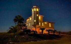 Lighthouse By The Sea